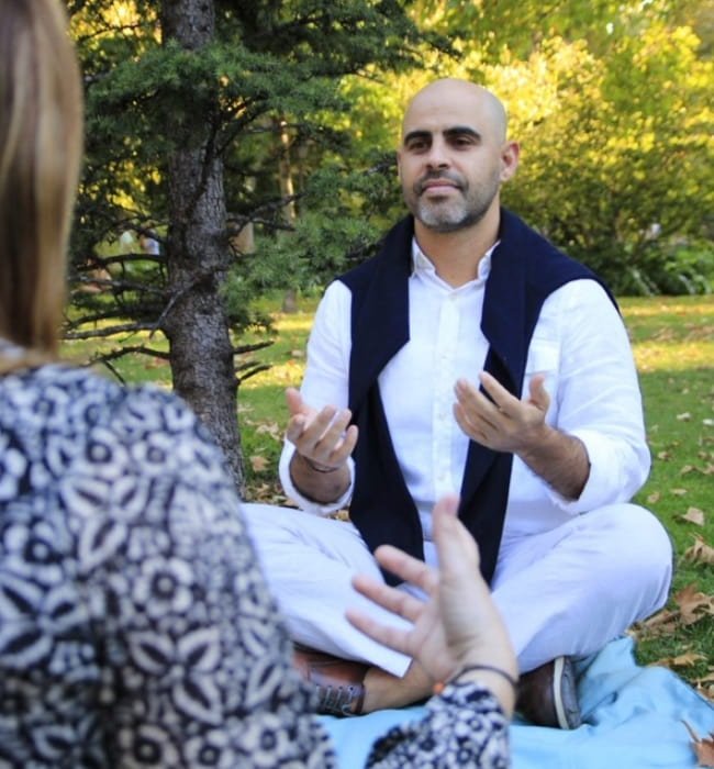 Sesión en vivo de coaching con un cliente en el Parque del Retiro